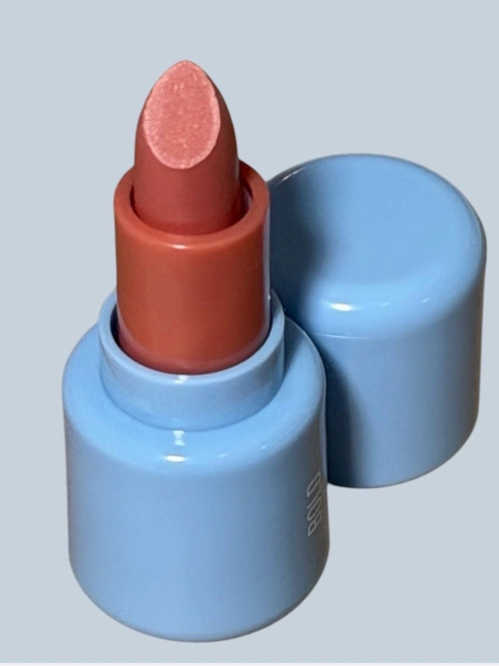 Realher Beauty Lipstick in shade BOLD. Comes new and sealed!